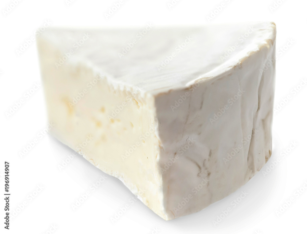 Piece of camembert cheese isolated on white background close up. Fresh soft cheese.