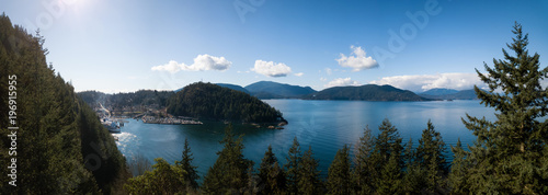 Aerial panoramic view of Horseshoe Bay in Howe Sound during a vibrant sunny day. Taken West Vancouver, British Columbia, Canada.