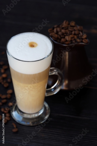 Fototapeta Naklejka Na Ścianę i Meble -  Fresh delicious latte coffee on the table