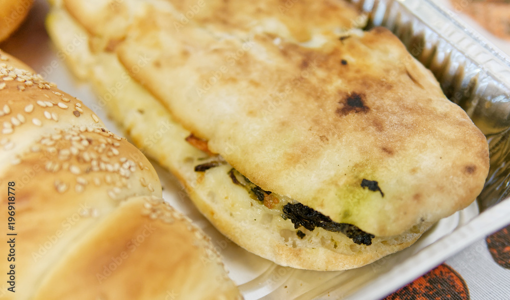 detail of a sandwich with Turnip Tops and provola