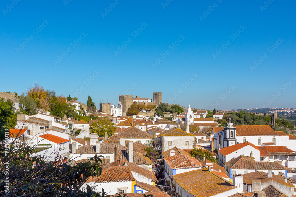 Obidos, Portugal. December 2, 2017. Urban scene of the small town of Obidos, in the interior of Portugal. Obidos, Portugal. December 2, 2017. Urban scene of the small town of Obidos, in the interior of Portugal.