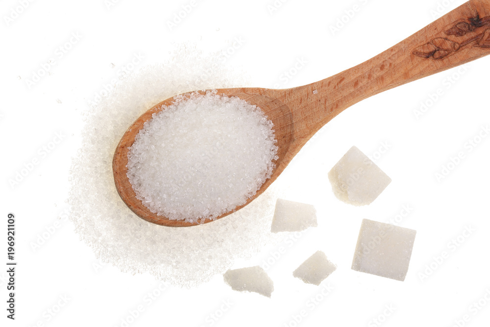 granulated sugar in wooden spoon with cube isolated on white background. Top view. Flat lay granulated sugar in wooden spoon with cube isolated on white background. Top view. Flat lay
