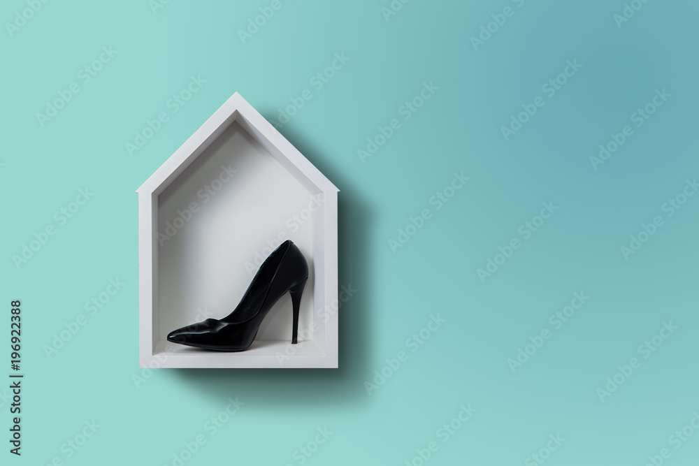 High heels, the shoe lies in a white house hung on the wall. Fashion  concept, catwalk. Online store, fashion store, sale of shoes. Pastel, green  background.Footwear. Female shoes. Stock Photo | Adobe