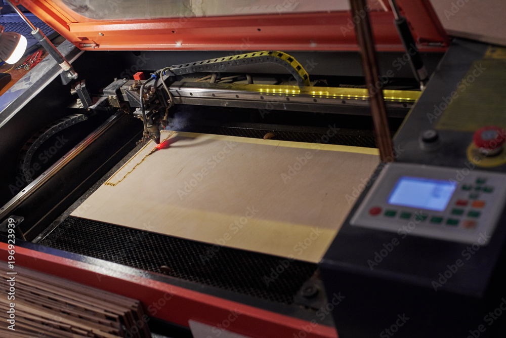 Laser programmable machine cutting of plywood shapes for the box