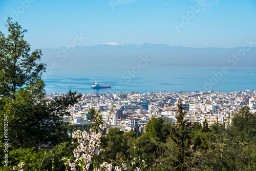 Ship in the gulf of Thessaloniki, Greece, on a sunny sky