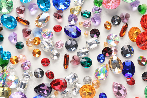 Vászonkép Colorful precious stones for jewellery on white background