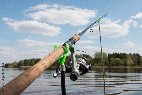 fishing pole on the river bank