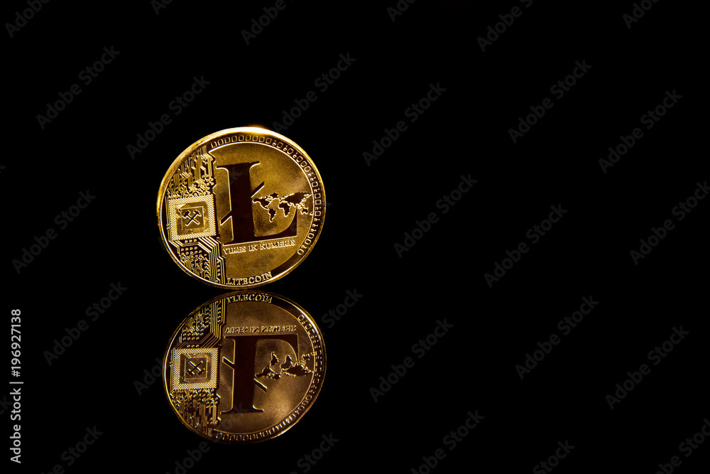 Criptocurrency concept golden litecoin coin on blak mirror surface Criptocurrency concept golden litecoin coin on blak mirror surface