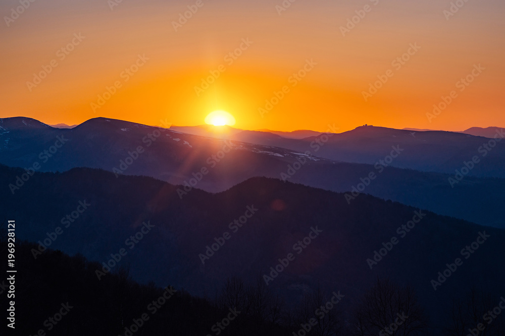 Beautiful evening sunset at Caucasian mountains with snow peaks, Arkhyz, Russia
