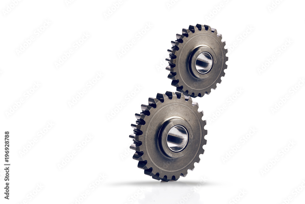 metal rotating gears on white isolated background metal rotating gears on white isolated background