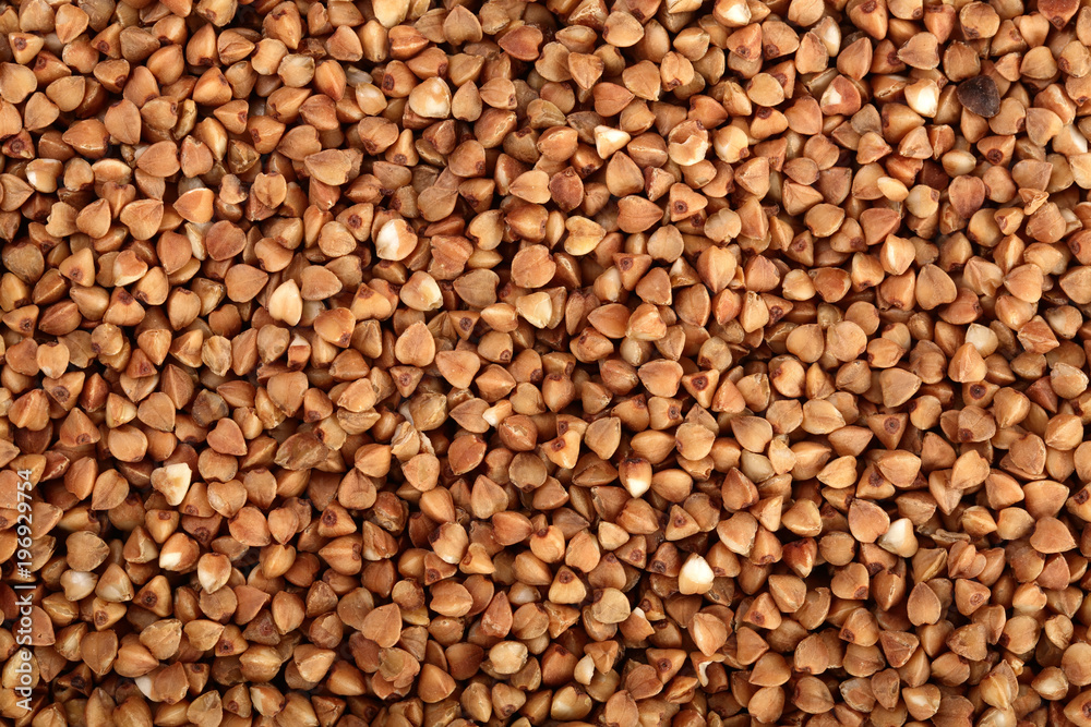 buckwheat grain as a background close up. Top view buckwheat grain as a background close up. Top view