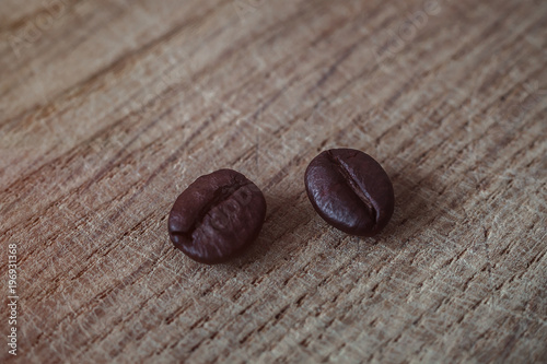 Coffee beans on wooden background