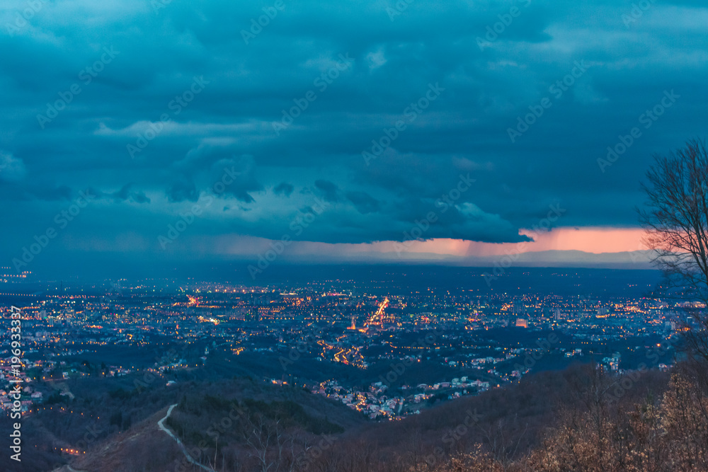 Landscape view of stormy, rainy clouds and rain over the city of Zagreb, Croatia. 