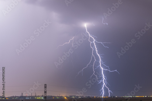 Lightning flash over a city lectricity blast storm