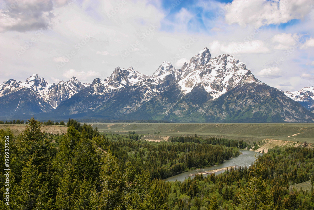 Grand Teton mountain range with the Snake River in the foregound in Grand Teton National Park in Jackson Hole, Wyoming.