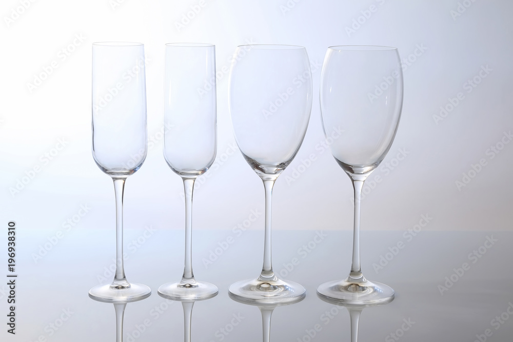 four. empty wine glass on a light background four. empty wine glass on a light background