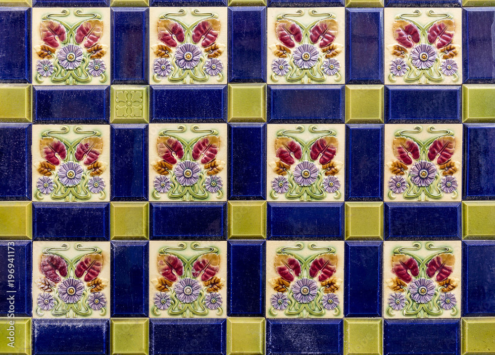 pattern of multicoloured tiles with painted embossed flower shapes pattern of multicoloured tiles with painted embossed flower shapes