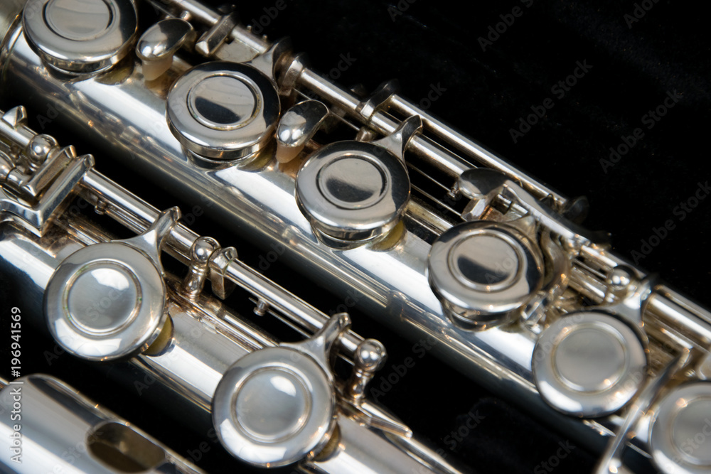 Naklejka premium Close up of the silver plated musical instrument flute