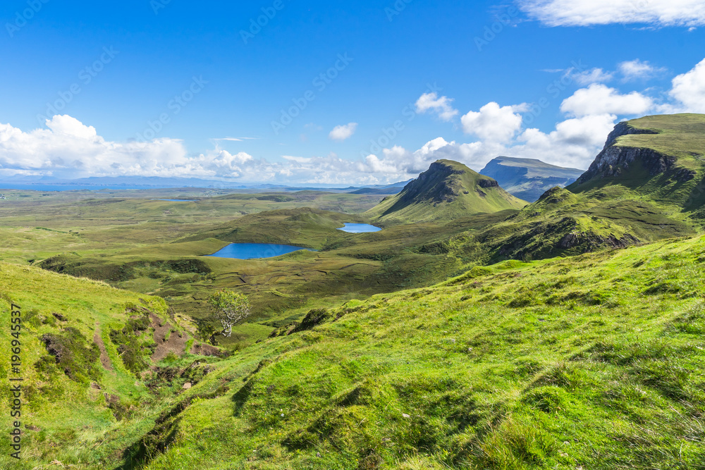 View of Quiraing mountains in a sunny day, Isle of Skye, Scotland, Britain