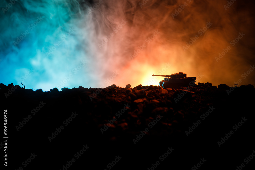 War Concept. Military silhouettes fighting scene on war fog sky background, World War German Tanks Silhouettes Below Cloudy Skyline At night. Attack scene. Armored vehicles. Tanks battle. Close up War Concept. Military silhouettes fighting scene on war fog sky background, World War German Tanks Silhouettes Below Cloudy Skyline At night. Attack scene. Armored vehicles. Tanks battle. Close up
