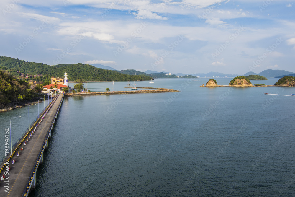 the harbor pier of langkawi and its islets on the horizon malaysia