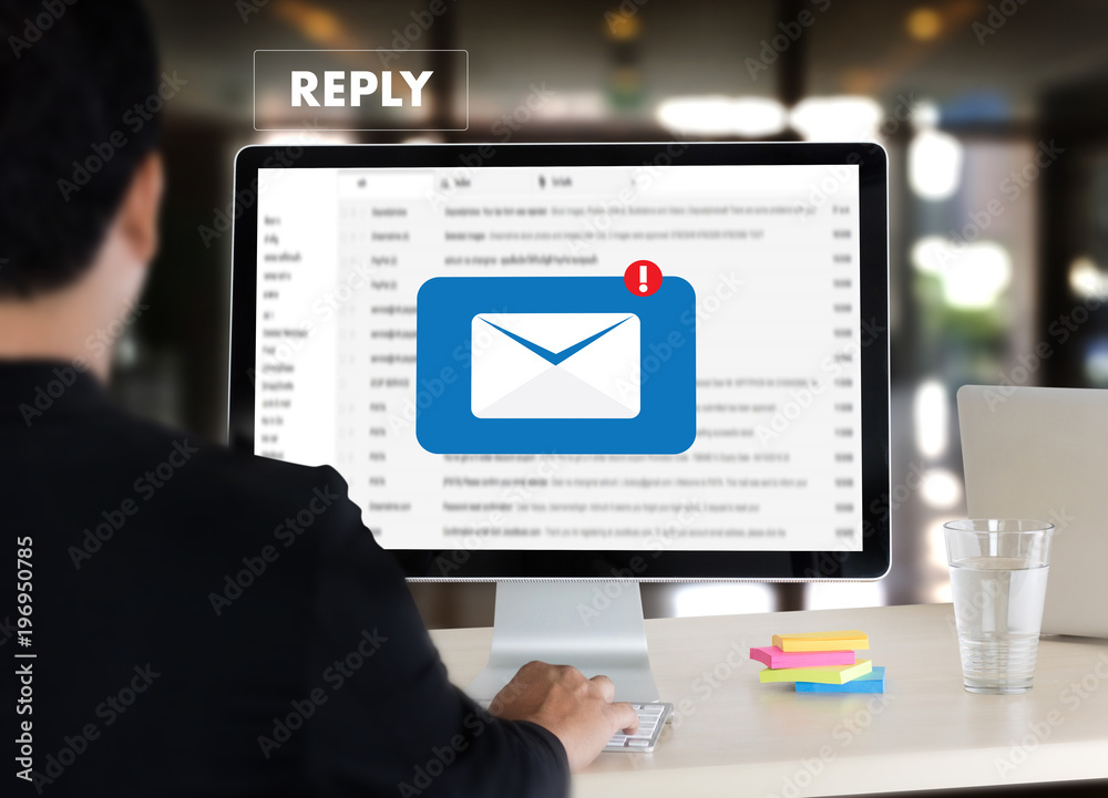 reply the message email on computer Businessman is working to important reminder