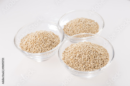 Quinoa grains in bowl isolated on white background, Chenopodium quinoa