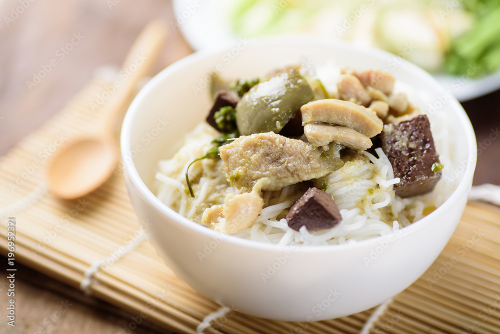 Thai food, rice noodles with green curry chicken (Kanom Jeen Kang Keaw Wan Gai) Thai food, rice noodles with green curry chicken (Kanom Jeen Kang Keaw Wan Gai)