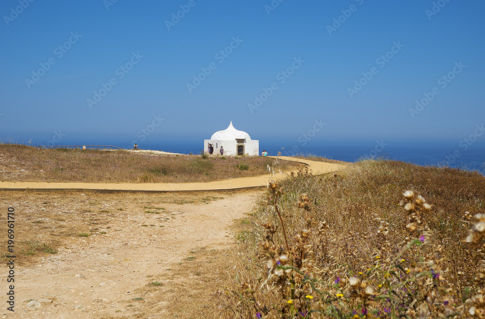 Path near Ermida da Memoria or Memory Chapel of Nossa Senhora do Cabo Church near cape Espichel, Portugal