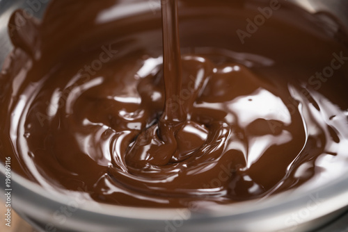 melting dark chocolate in steel bowl