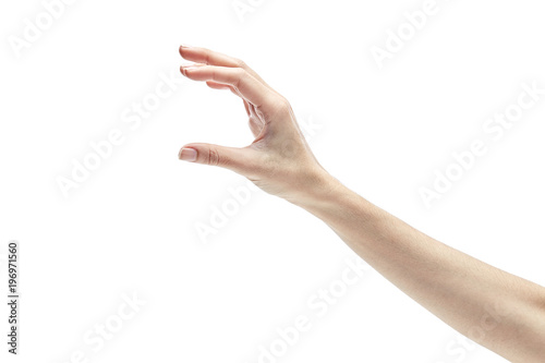 woman's hand measuring invisible items on white