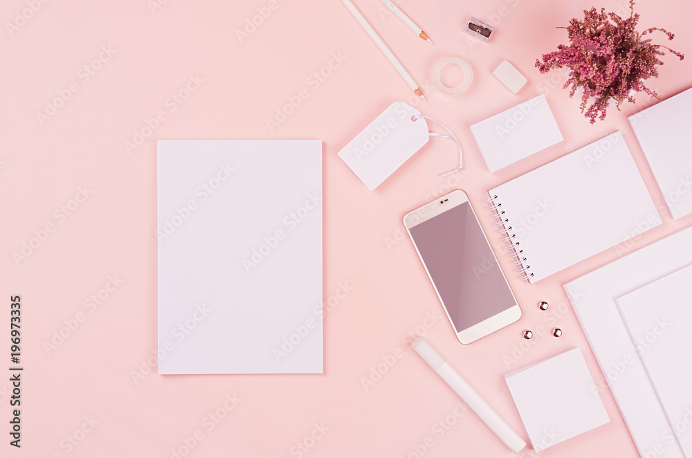 White blank stationery set with heather flowers, phone on soft pink elegance stylish background. Mock up for branding, business presentations and portfolios, spring workplace. White blank stationery set with heather flowers, phone on soft pink elegance stylish background. Mock up for branding, business presentations and portfolios, spring workplace.