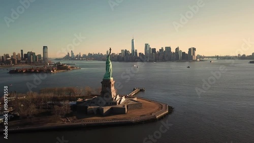 Statue Of Liberty Aerial Moving Forward over Water Toward Manhattan New York City Skyline 4K and 1080 HD NYC