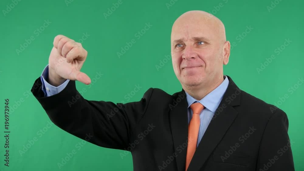 Businessman Showing Thumbs Down Dislike Sign Smiling and Pointing with Finger Businessman Showing Thumbs Down Dislike Sign Smiling and Pointing with Finger