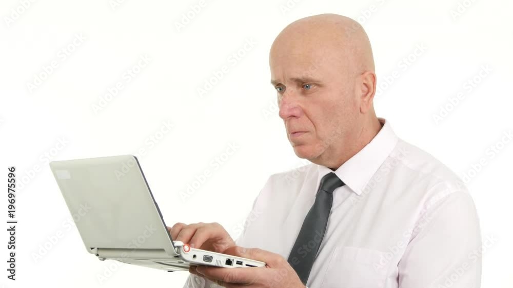 Upset Businessman Read on Laptop Online Bad News and Make Nervous Hand Gestures Upset Businessman Read on Laptop Online Bad News and Make Nervous Hand Gestures