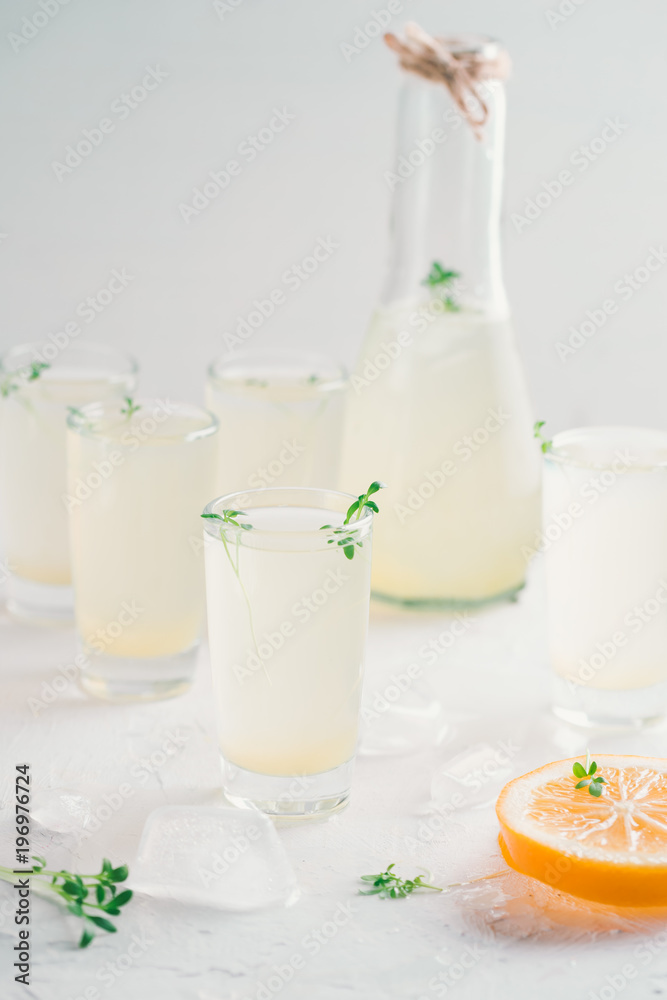 Alcohol shots with lemon liquor. Limoncello in glass shots. Alcohol shots with lemon liquor. Limoncello in glass shots.