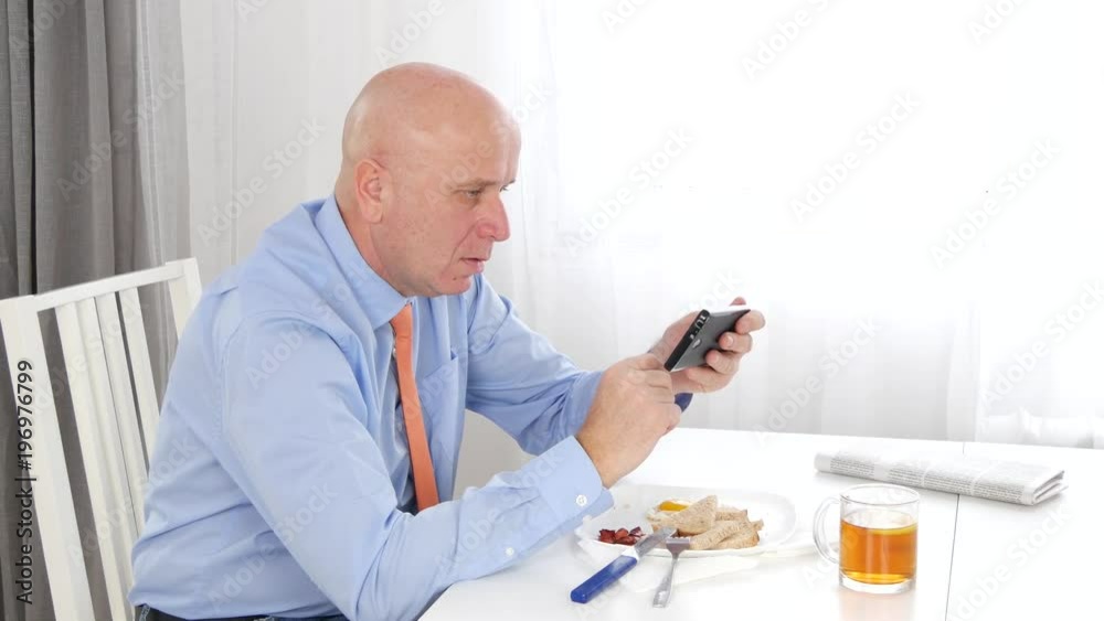 Businessman Take Dinner Read Bad News on Mobile Email Box Gesturing Nervous Businessman Take Dinner Read Bad News on Mobile Email Box Gesturing Nervous
