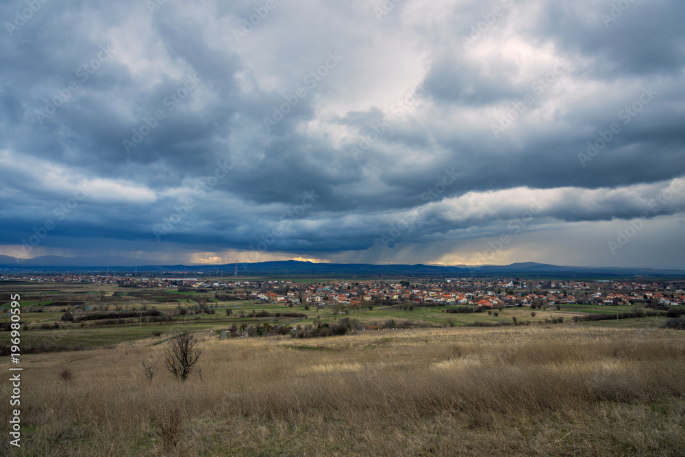 Dramatic cloudscape near Bulgarian village.