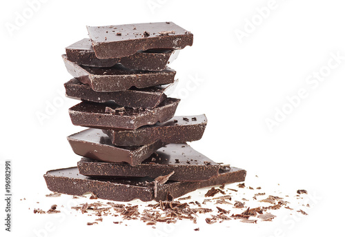 Pile of broken chocolate bar on a white background