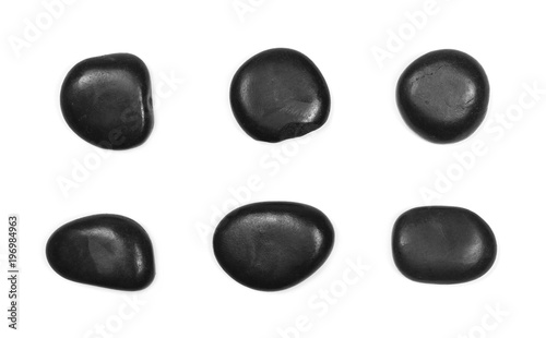 Photography Pile black rocks isolated on white background, top view