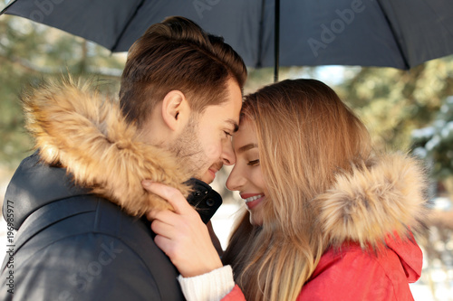 Young romantic couple with ...