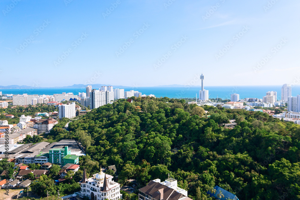 Thailand aerial high view from Pattaya buildings, park, ocean beach and condominiums. Downtown with blue clear sky. Sunny day