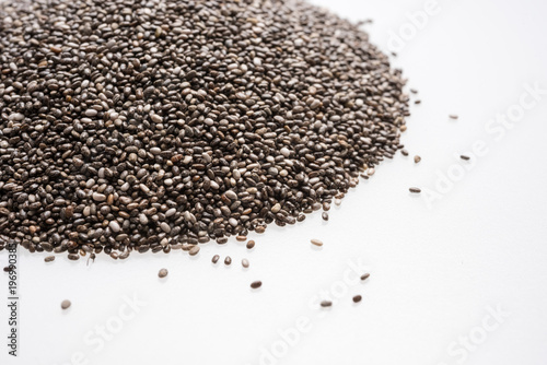 Chia seeds isolated with white background. Healthy superfood.