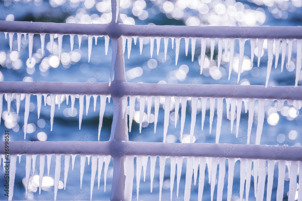 Icicles on the railing of the pier and a sunny bokeh on the water. Spring joyful mood.
Icicles on the railing of the pier and a sunny bokeh on the water. Spring joyful mood.