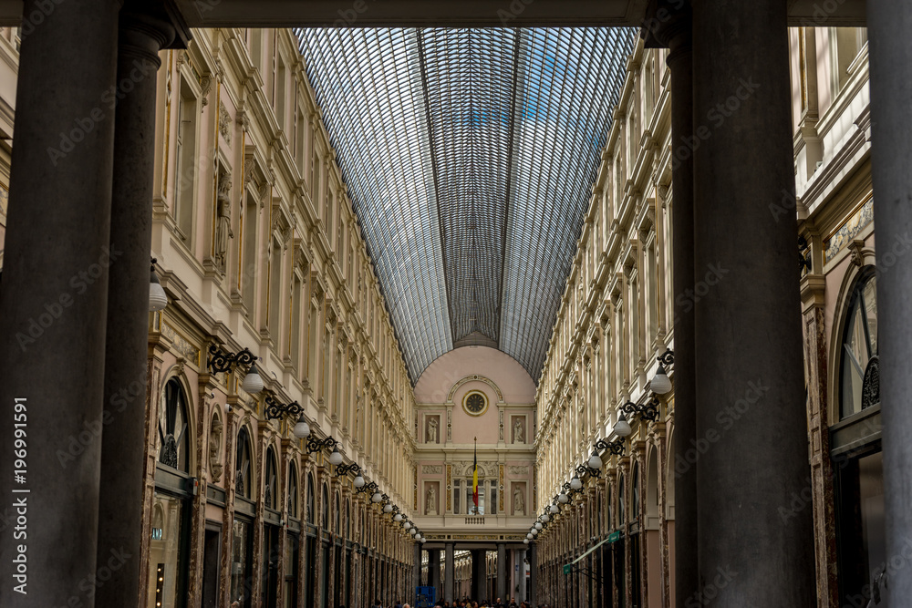 Beautiful glass dome in between majestic pillars at  Galeries Royales St.Hubert in city of Brussels, Belgium