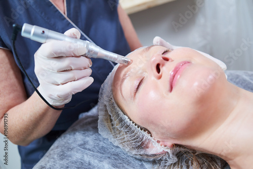 cosmetology. female facial skin beauty procedure in salon