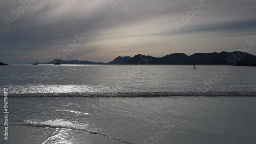 Sunset on the empty Roervik beach, Lofoten island, Norway photo