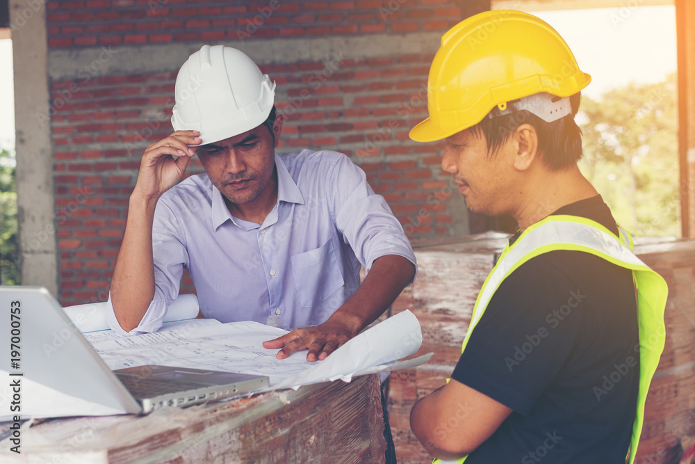 architect and engineer inspect housing estate building to success construction plan before send quality housing to customers ;Showing thumb up for good teamwork . architect and engineer inspect housing estate building to success construction plan before send quality housing to customers ;Showing thumb up for good teamwork .