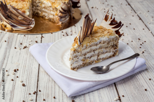 Chocolate vegane cake with nuts and cream. Birthday concept