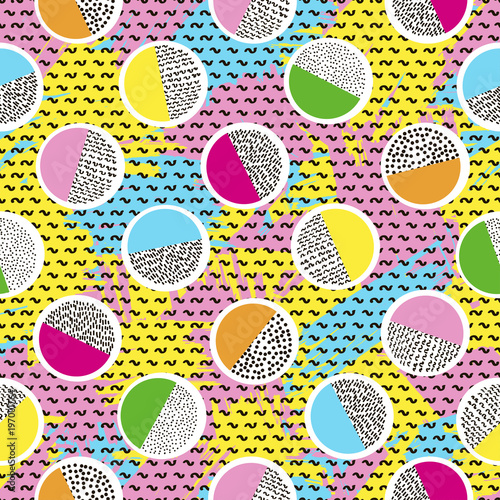 Colorful seamless pattern from circles on the bright brush strokes background and black dots.